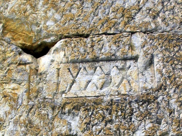 Roman numerals on cliff cut